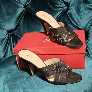 Fun and flirty floral print black heels